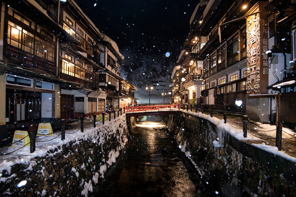 Snow falls outside the historic Ginzan onsen.
