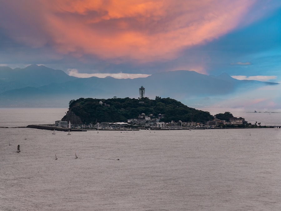 Enoshima with the sea candle visible as the island's highest point.