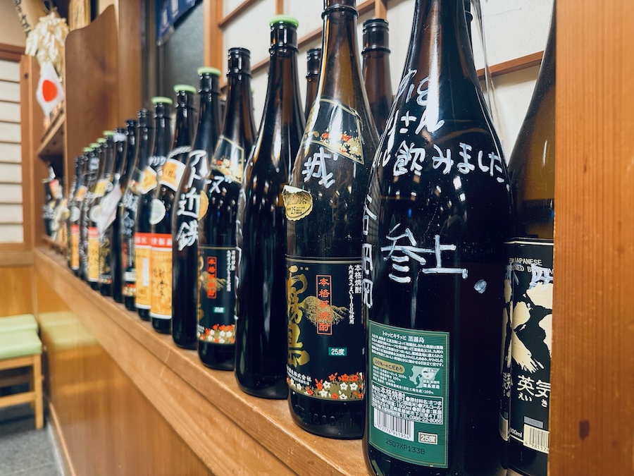 Bottles of sake at Ichigetsuya, an 100-year-old izakaya in Ise.