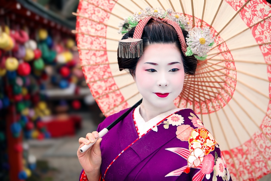 Watch geiko and maiko perform at Miyako Odori, Gion, Kyoto.