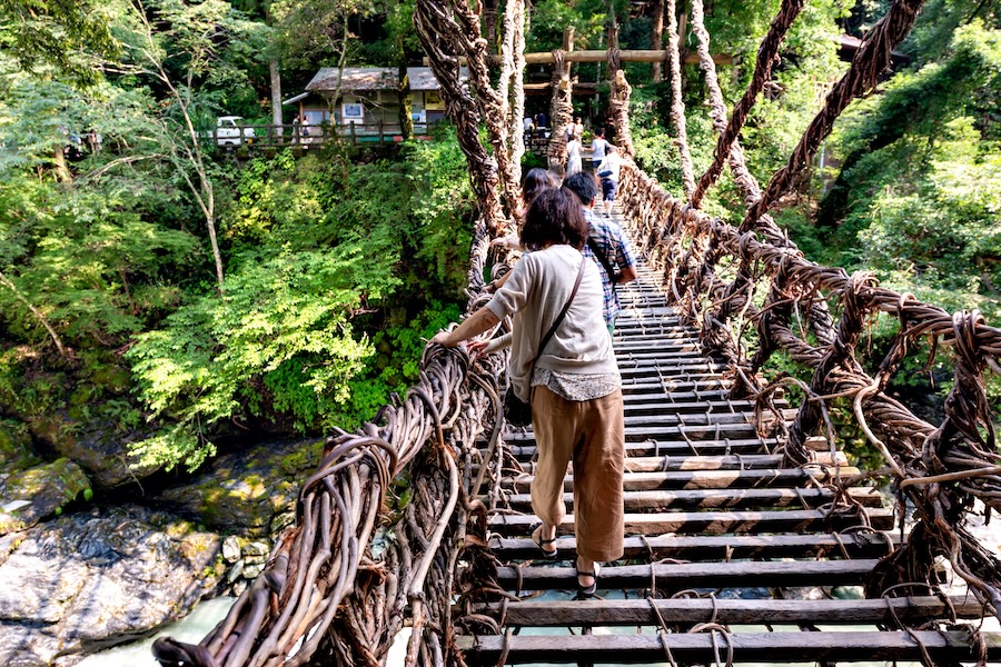 Crossing the Vine Bridge in the Iya Valley.