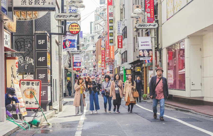 Tourists walking on Japan streets Tourists walking on Japan streets