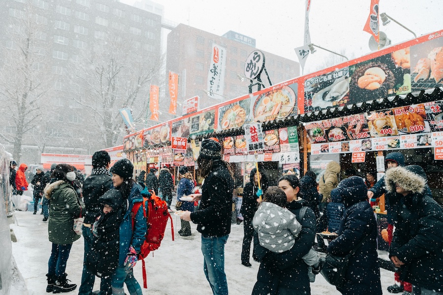 Japanese street food stalls to keep you warm during the Sapporo Snow Festival events. Japanese street food stalls to keep you warm during the Sapporo Snow Festival events.