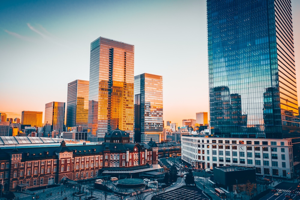 Tokyo Station's Marunouchi building with skyline views. 