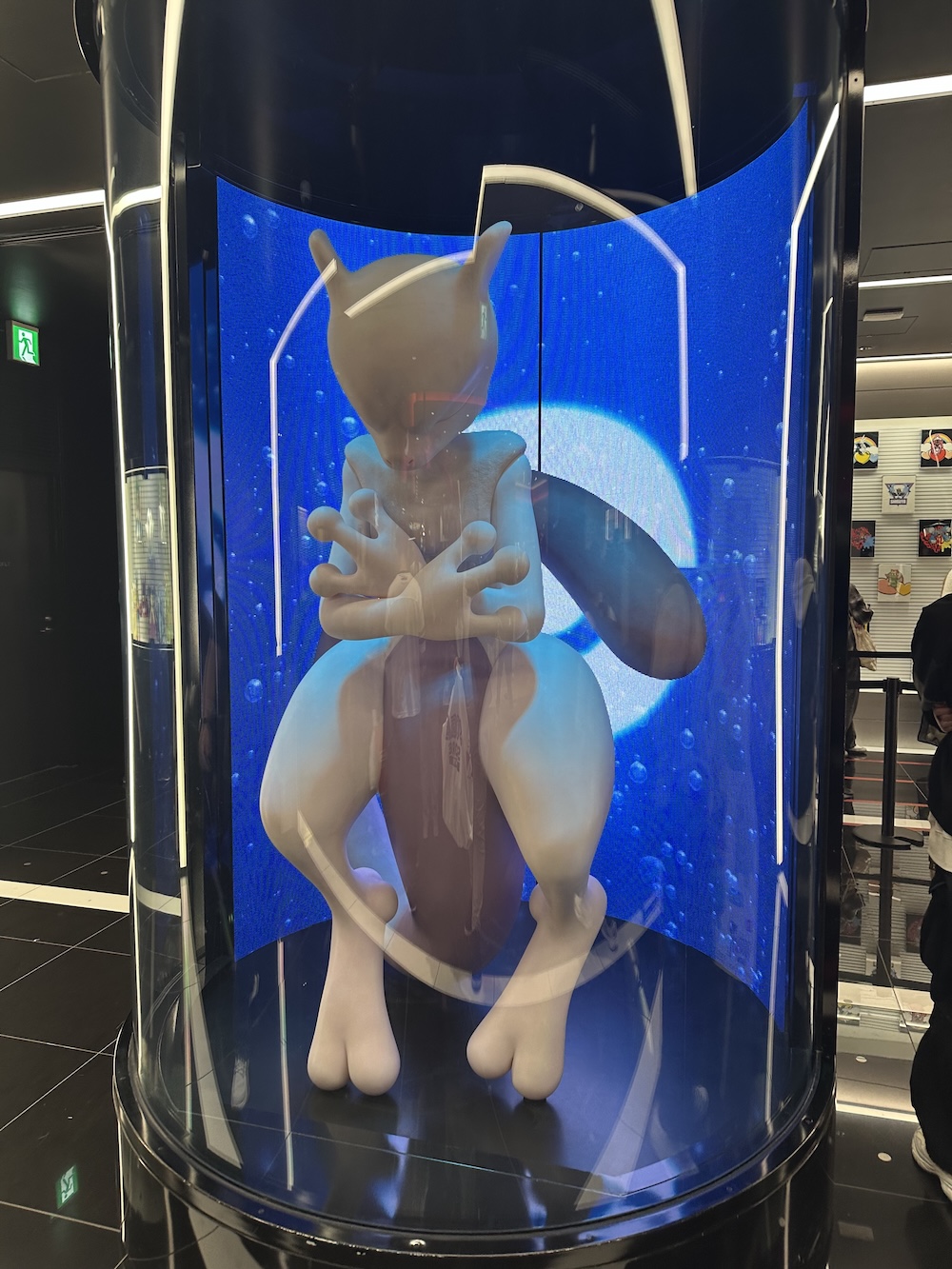 Mewtwo in a test tube is just one of the cool sights at Pokémon Center Shibuya. Mewtwo in a test tube is just one of the cool sights at Pokémon Center Shibuya.